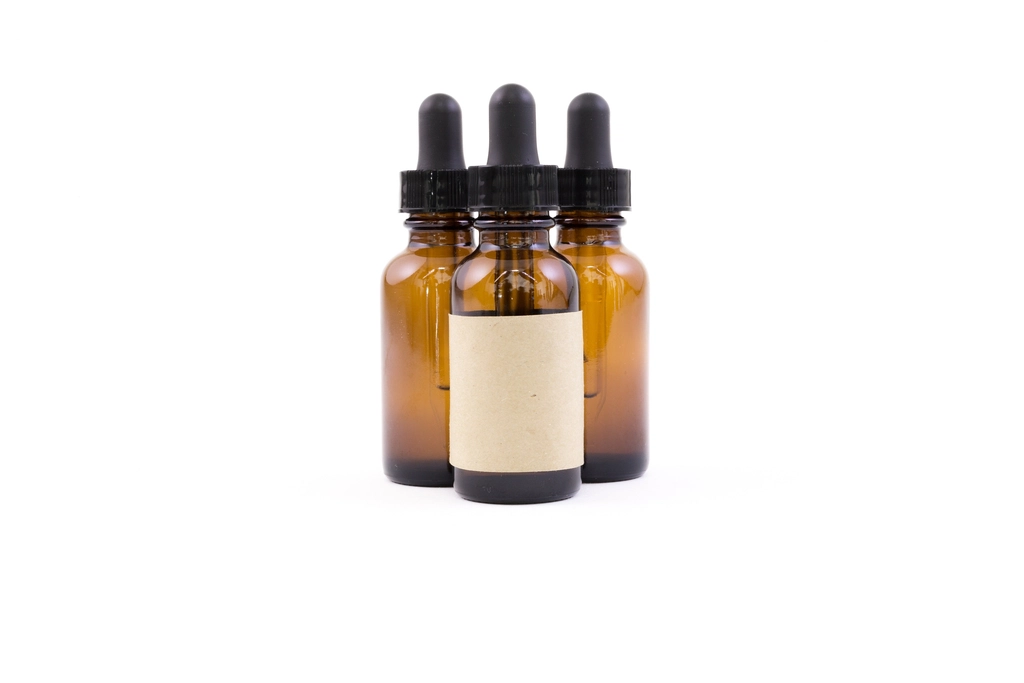 Multiple skincare bottles representing different peptide formulations